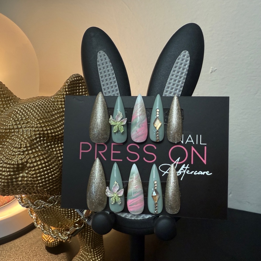 Gold and Green stiletto Press-On Nails with Whimsical Patterns